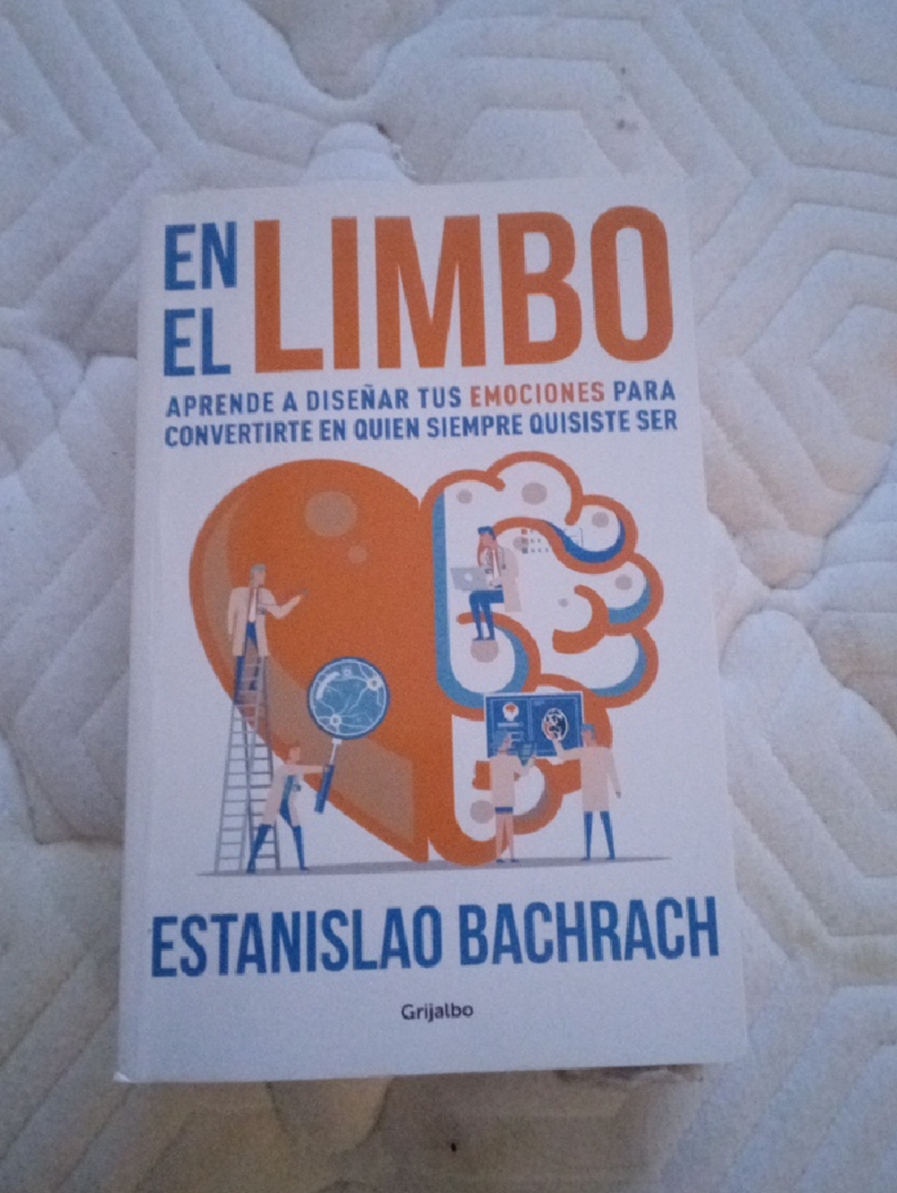 En El Limbo by Estanislao Bachrach - White & Orange Cover